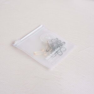 KNITS Valaisin silmukkamerkit Zip-pussissa